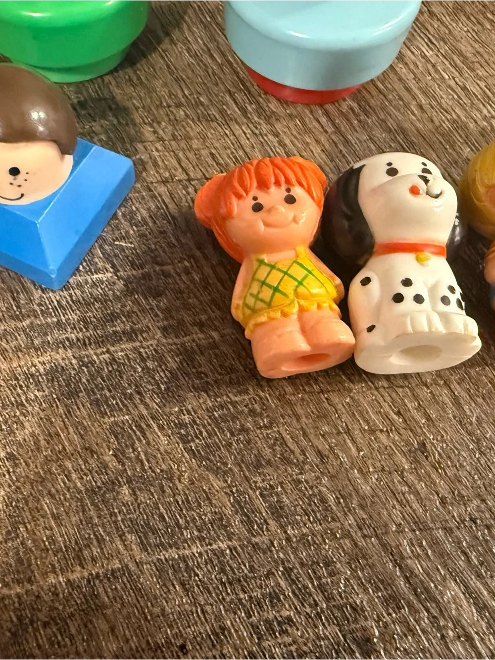 Fisher-Price Peg People Set with Bright Yellow, Blue, Green, Red, Brown